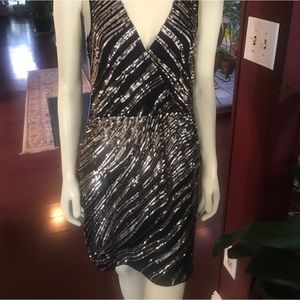 “NEW ARRIVALS” Women’s Brand-New Express Sleeve less sequin mini dress. Size M